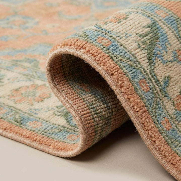 Translation missing: en.Close up of hand knotted wool pile showing natural fibers and artisan knot structure