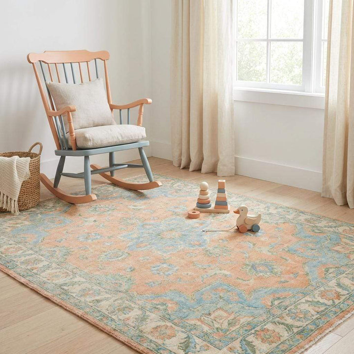 Translation missing: en.Elegant peach and blue wool rug suitable for bedroom or living room décor