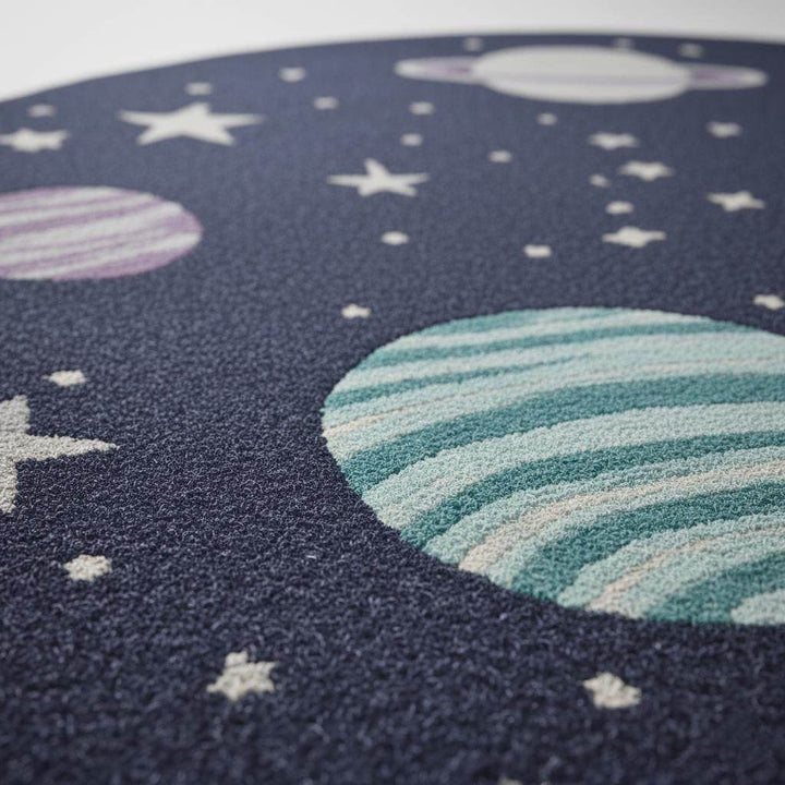 Translation missing: es.Space theme round rug with astronaut and planet design for nursery decor