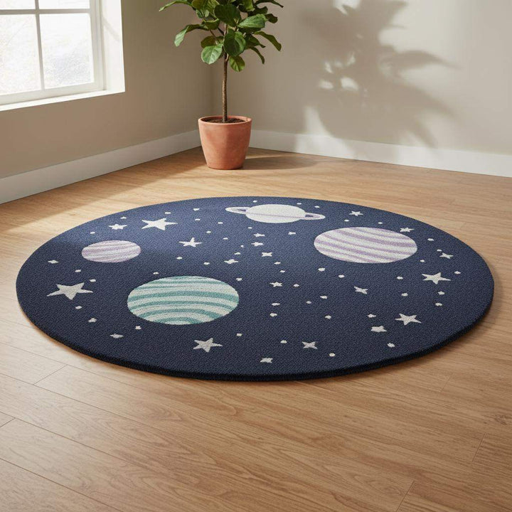 Translation missing: es.Space Theme Round Rug with astronaut and planet design in navy wool for nursery decor