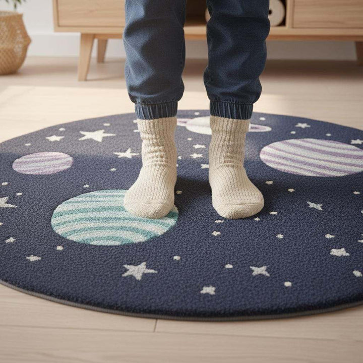 Translation missing: es.Space theme round rug with astronaut and planet design for nursery decor