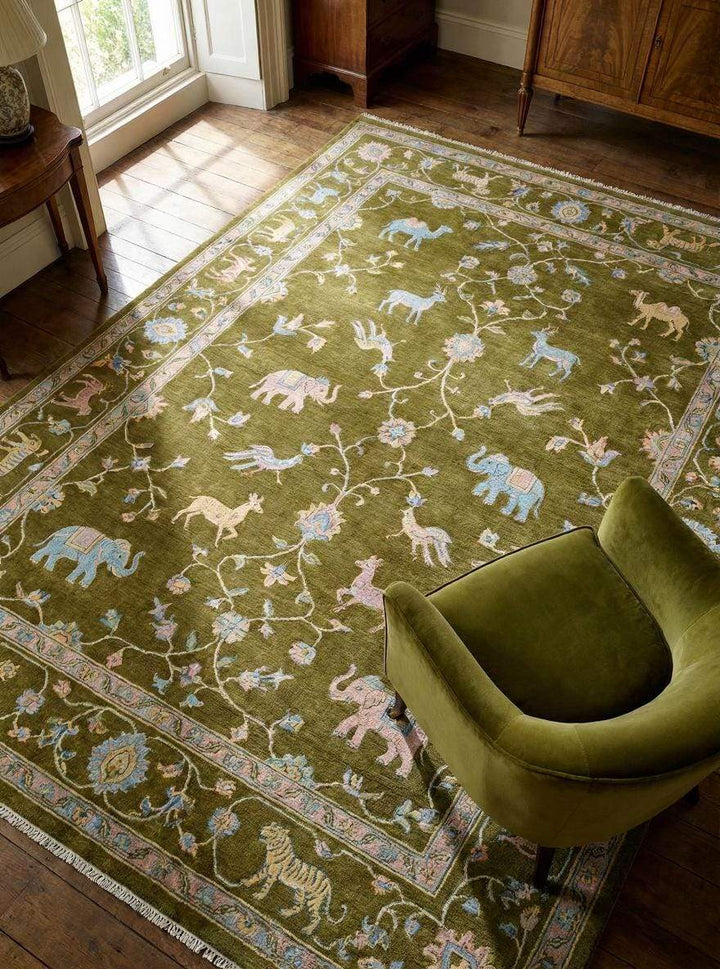 Translation missing: en.Tree of Life hand knotted wool area rug with animal motifs and rich green field