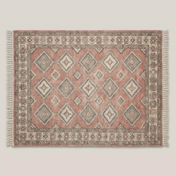 Translation missing: es.Vintage style Oushak rug with muted blush pink field and sage green geometric motifs