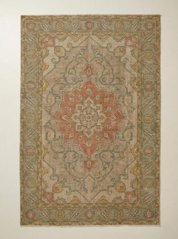 Translation missing: es.Vintage Oushak hand knotted wool rug with floral medallion and faded tones