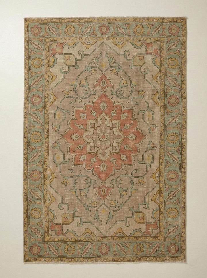 Translation missing: es.Vintage Oushak hand knotted wool rug with floral medallion and faded tones