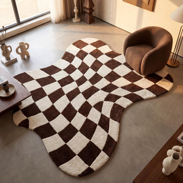 Translation missing: es.Handmade checkered wool rug in chocolate brown and ivory styled in a modern minimalist living room with curved furniture __etsy:8074304285