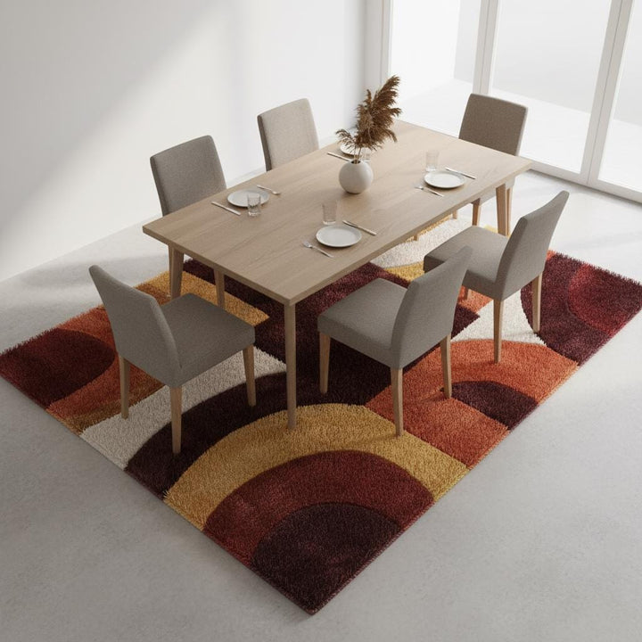 Translation missing: en.Mid century modern rug with geometric terracotta and mustard tones in a cozy living room setting