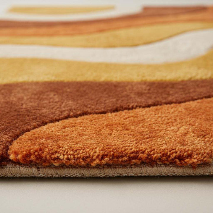 Translation missing: en.Retro sculpted shag rug with 70s wave pattern in mustard orange for mid century modern decor