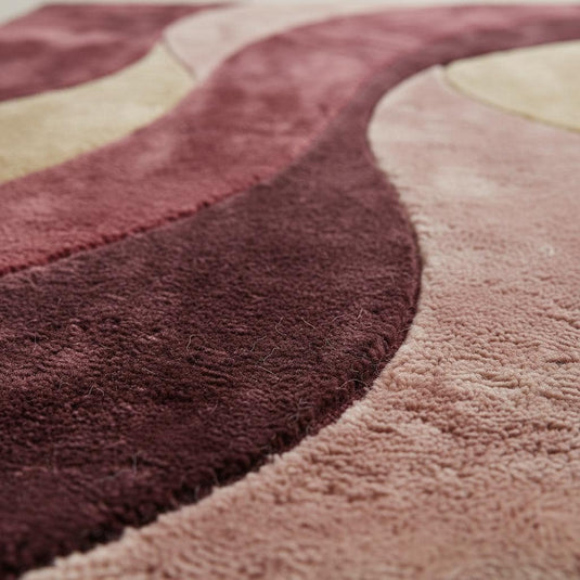 Translation missing: en.Retro wavy area rug in burgundy with plush geometric mid-century pattern