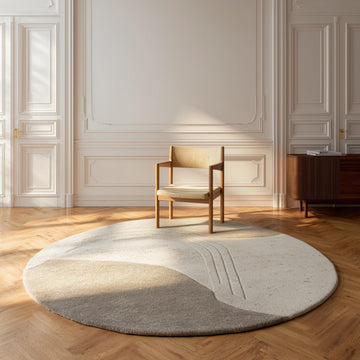 Translation missing: es.Neutral round sculpted wool rug with textured surface for minimalist living room decor
