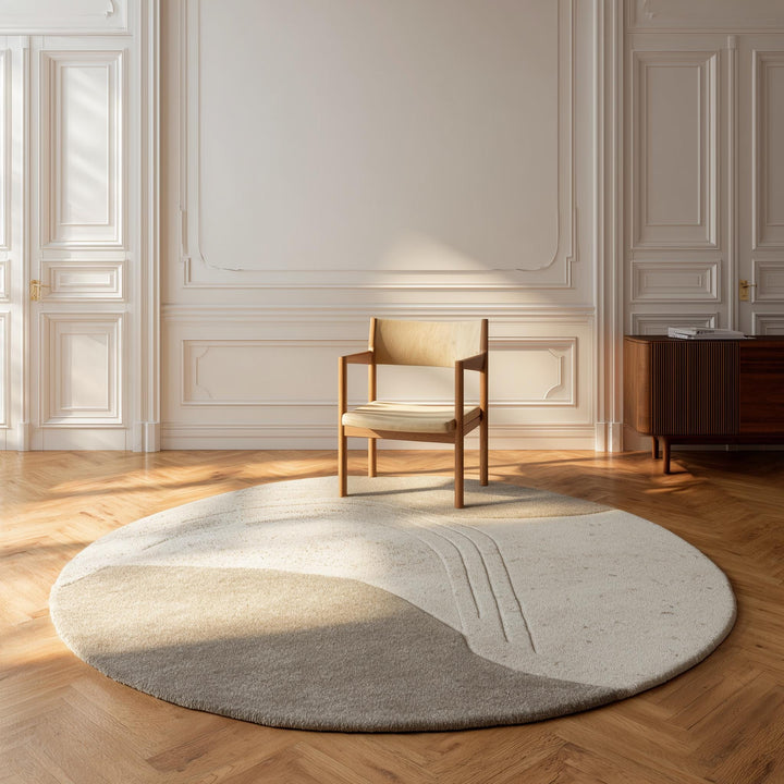 Translation missing: es.Neutral round sculpted wool rug with textured surface for minimalist living room decor
