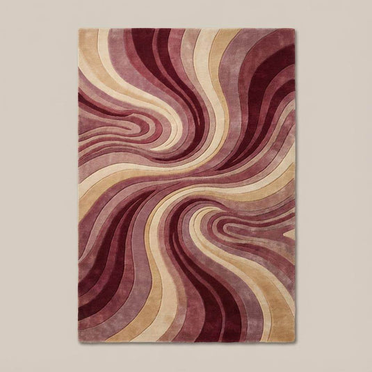 Translation missing: es.Plush abstract swirl rug featuring curved retro patterns, styled under an accent chair and indoor plants in a cozy living space