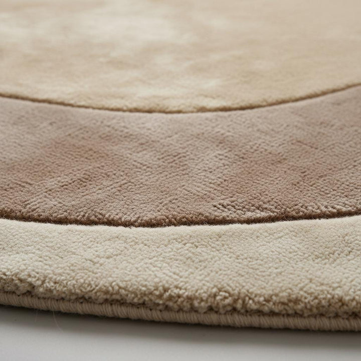 Translation missing: en.Close-up detail of a handmade tufted rug showing textured wool and stitching