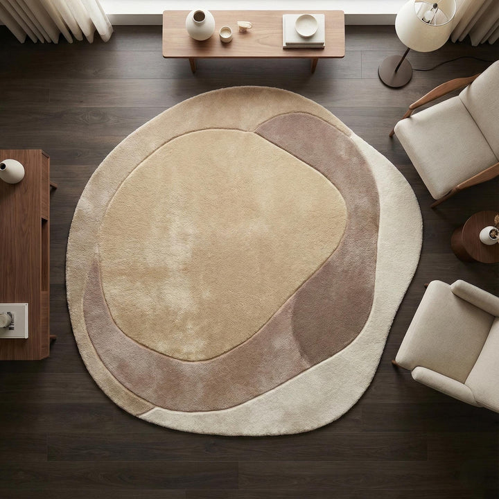 Translation missing: en.Modern abstract rug with organic shape, plush beige microfiber, anti-slip backing, and sculpted taupe pattern