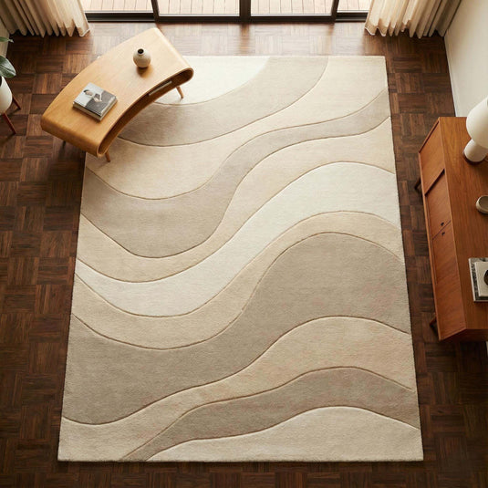 Translation missing: es.Beige cream area rug with wavy pattern for minimalist living room decor