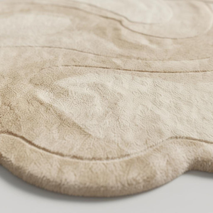 Translation missing: en.Ivory organic cloud area rug with soft plush texture and sculptural abstract shape for modern neutral home decor