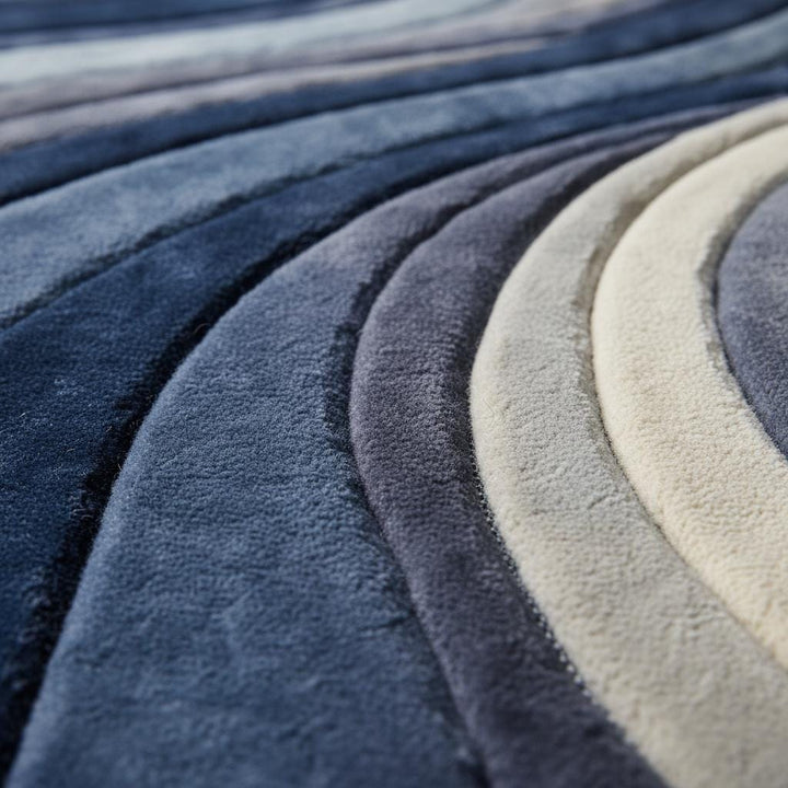 Translation missing: en.Mid century modern rug with blue sculpted wave pattern and plush textured surface