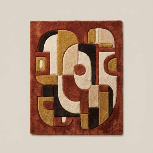 Translation missing: en.Top down view of mid century modern abstract rug displaying full geometric pattern, curved shapes, and earth tone color palette with terracotta, cream, and mustard accents