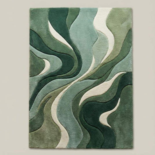 Translation missing: en.Top-down view of modern green abstract area rug displaying flowing wave design, layered green tones, and soft ivory accents
