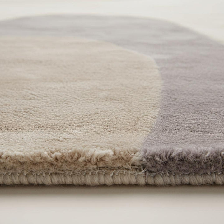 Translation missing: es.Abstract neutral area rug with organic shape and beige cream tones, modern minimalist living room carpet
