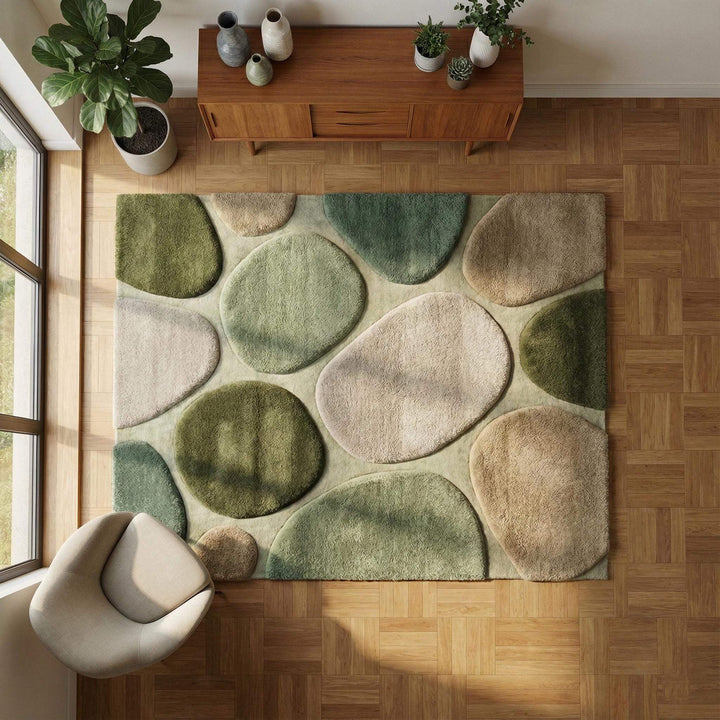 Translation missing: es.Organic modern area rug with sculpted pebble pattern, green neutral tones, and plush low pile for nursery and living room comfort