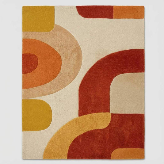 Translation missing: es.Modern mid-century accent rug featuring abstract curved shapes in cream, orange, and mustard tones styled beneath a yellow armchair