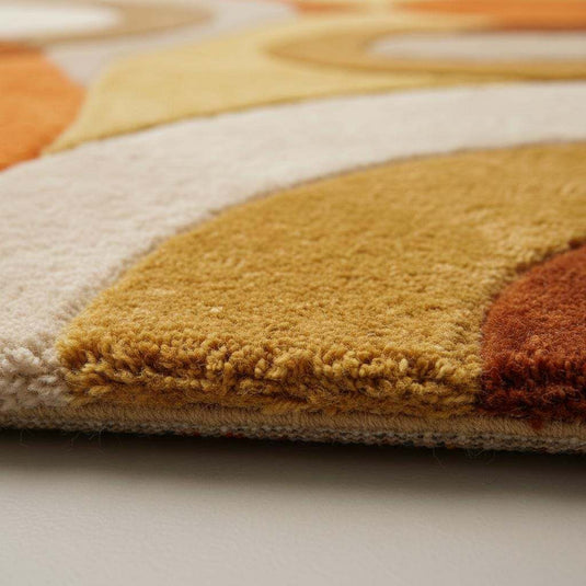 Translation missing: es.Retro shag rug in orange and mustard with plush mid-century design and abstract pattern