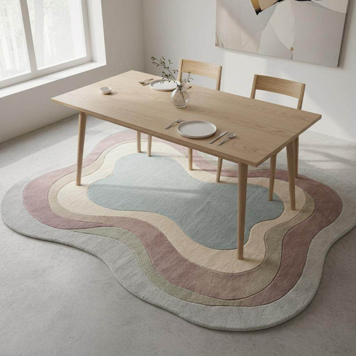 Translation missing: en.Cozy modern decor scene featuring a handcrafted wool rug with soothing color gradients and curved, organic edges