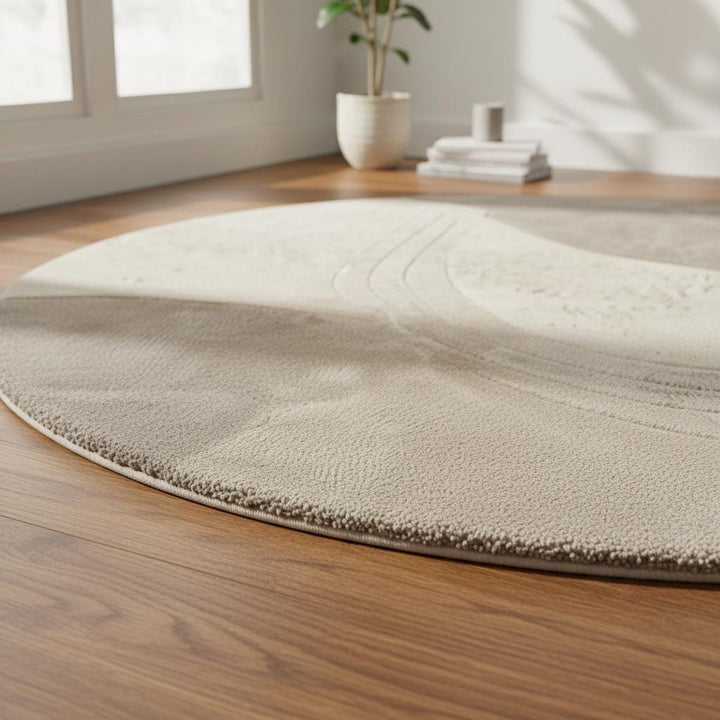 Translation missing: es.Luxury beige and cream circular carpet made from wool, styled in a serene Japandi-inspired room with natural sunlight