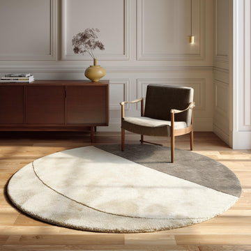 Translation missing: en.Modern round area rug with two tone cream and taupe plush tufted texture and geometric pattern