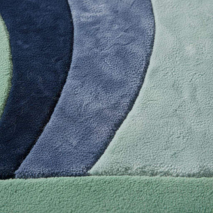 Translation missing: en.Modern abstract wave rug with sculpted pile in mint, navy, and blue tones for modern and mid century home decor