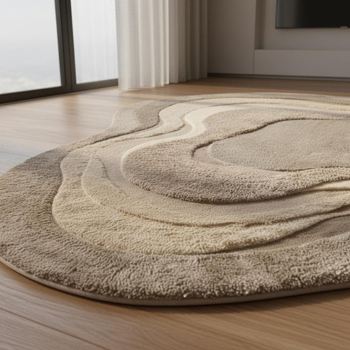 Translation missing: en.Abstract organic-shaped area rug in beige and taupe tones, photographed from above in a serene modern home setting