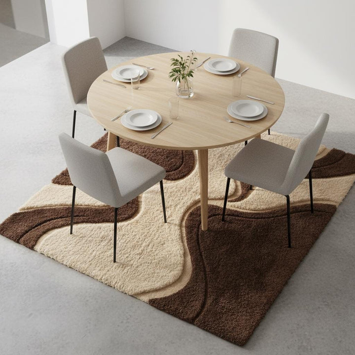 Translation missing: en.Plush retro geometric carpet with 1970s-style wavy pattern, photographed in a bright room with natural light and mid-century furniture