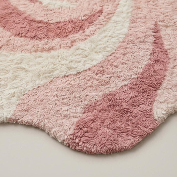 Translation missing: en.Pink abstract rug with irregular shape and wavy swirl pattern in soft plush shag material