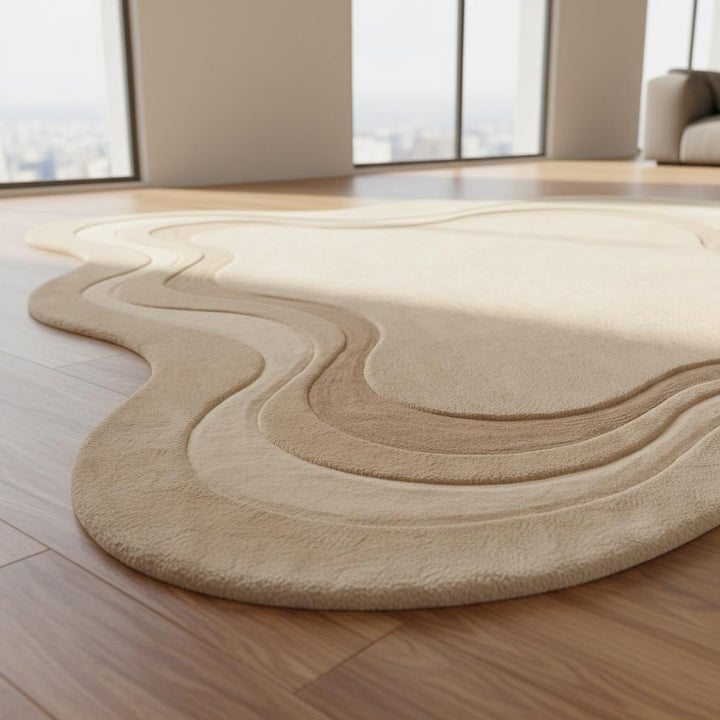Translation missing: en.Curved organic area rug with layered contour design placed on herringbone wood flooring