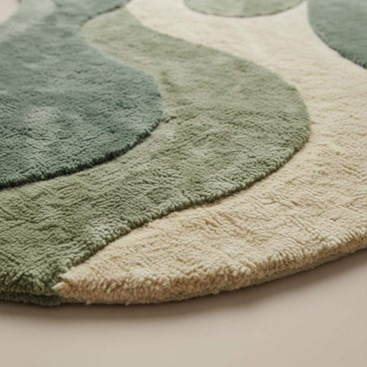 Translation missing: es.Organic shape area rug in sage green with plush abstract design for modern living room and bedroom décor