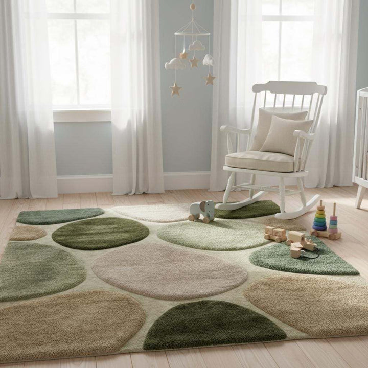 Translation missing: es.Soft plush area rug in a nursery setting with calming green and neutral colors, providing a cozy, gentle surface ideal for kids’ rooms and family spaces